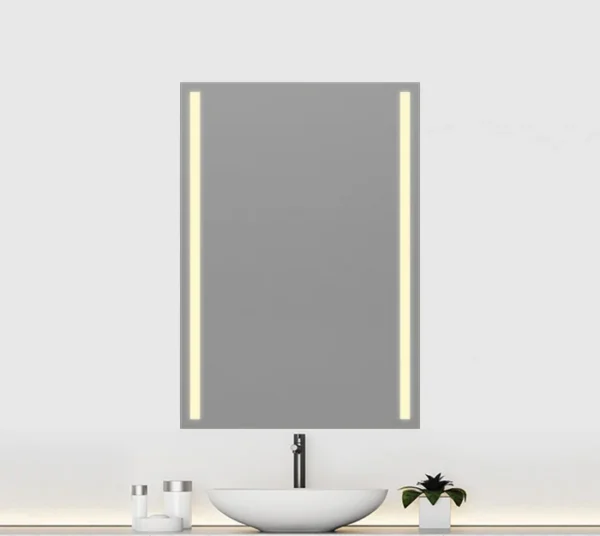 A rectangular-shaped mirror with warm LED light strips on its either side.