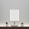 24x30 model of a warm, illuminated mirror on a plain wall.