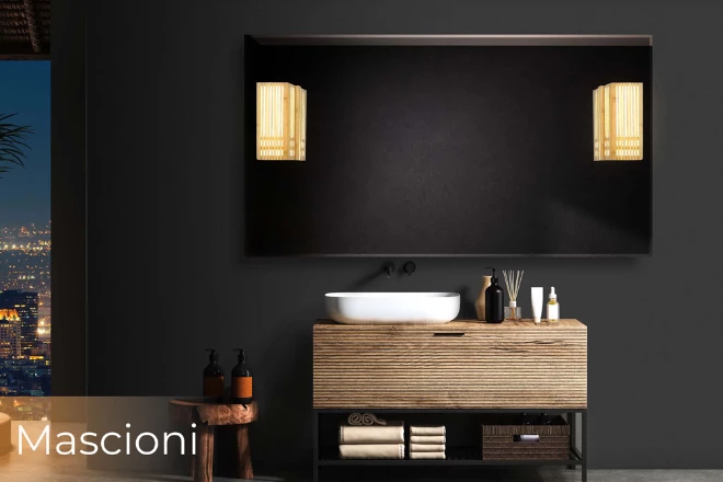 Frameless mirror with a Mascioni lamp installed in a black wall above a bathroom cabinet.