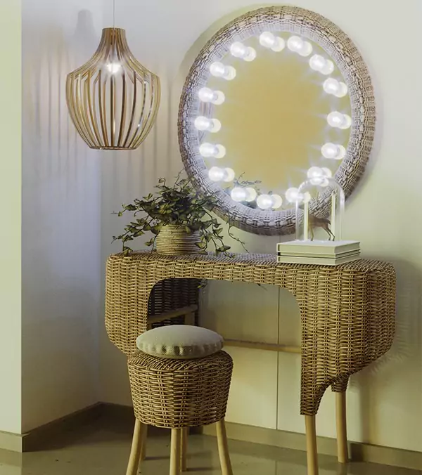 A snippet of a Hollywood mirror with a rattan-made vanity set and elipsa wooden pendant lamp.