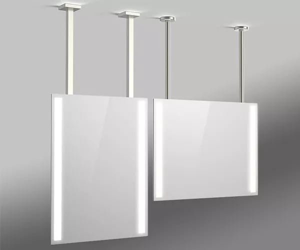 Two ceiling-mounted mirrors with LED lights on either side reflect in a well-lit room.